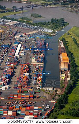 Stock Photo - Aerial view, Logport in Rheinhausen am Rhein with Container Terminal and Rhine flood, Duisburg, Ruhr district, North Rhine-Westphalia, Germany, Europe. Fotosearch