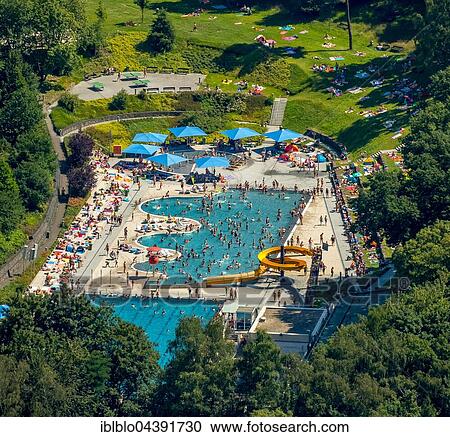 Aerial view, pool, swimmer pool with a wavy margin, lawn, Bathers in outdoor pool Annen, Witten, Ruhr district, North Rhine-Westphalia, Germany, Europe View Large Photo Image Stock Image - Aerial view, pool, swimmer pool with a wavy margin, lawn, Bathers in outdoor pool Annen, Witten, Ruhr district, North Rhine-Westphalia, Germany, Europe. Fotosearch