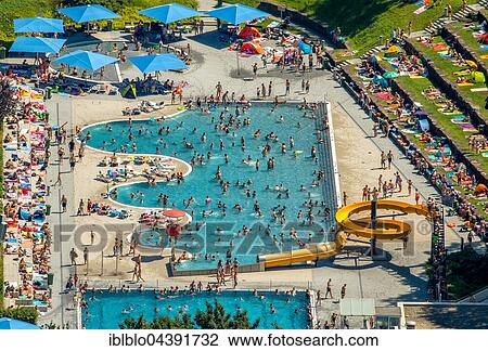 Aerial view, pool, swimmer pool with a wavy margin, lawn, Bathers in outdoor pool Annen, Witten, Ruhr district, North Rhine-Westphalia, Germany, Europe View Large Photo Image Stock Image - Aerial view, pool, swimmer pool with a wavy margin, lawn, Bathers in outdoor pool Annen, Witten, Ruhr district, North Rhine-Westphalia, Germany, Europe. Fotosearch