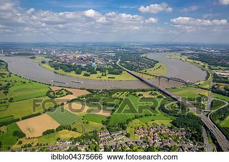 Aerial view, Rheinbogen, Rhine between Duisburg Baerl and Beeckerwerth, Flood, Railway Bridge, A42 motorway bridge, Duisburg, Ruhr district, North Rhine-Westphalia, Germany, Europe View Large Photo Image Stock Photograph - Aerial view, Rheinbogen, Rhine between Duisburg Baerl and Beeckerwerth, Flood, Railway Bridge, A42 motorway bridge, Duisburg, Ruhr district, North Rhine-Westphalia, Germany, Europe. Fotosearch