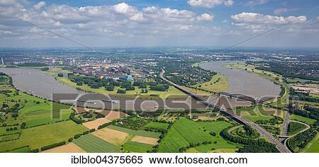 Aerial view, Rheinbogen, Rhine between Duisburg Baerl and Beeckerwerth, Flood, Railway Bridge, A42 motorway bridge, Duisburg, Ruhr district, North Rhine-Westphalia, Germany, Europe View Large Photo Image Stock Photography - Aerial view, Rheinbogen, Rhine between Duisburg Baerl and Beeckerwerth, Flood, Railway Bridge, A42 motorway bridge, Duisburg, Ruhr district, North Rhine-Westphalia, Germany, Europe. Fotosearch