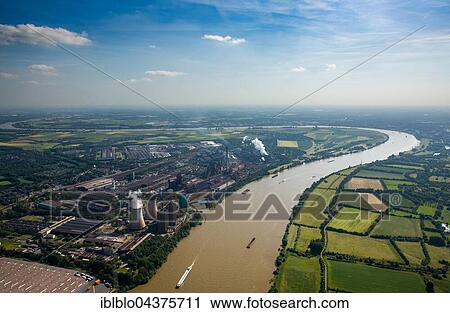 Aerial view, steelworks HKM the district Hüttenheim am Rhein with floods, Duisburg, Ruhr district, North Rhine-Westphalia, Germany, Europe View Large Photo Image Stock Image - Aerial view, steelworks HKM the district Hüttenheim am Rhein with floods, Duisburg, Ruhr district, North Rhine-Westphalia, Germany, Europe. Fotosearch