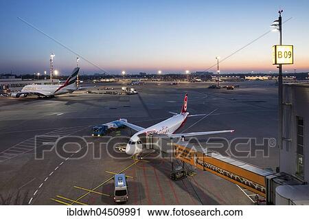 Stock Image - Aircrafts on runway, Airberlin and Emirates, Düsseldorf Airport, Düsseldorf, North Rhine-Westphalia, Germany, Europe. Fotosearch