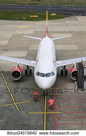 Stock Image - Airplane at the gate, Düsseldorf-International airport, Düsseldorf, North Rhine-Westphalia, Germany, Europe. Fotosearch