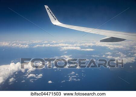 Airplane wing, Ryanair plane over Greece View Large Photo Image Stock Image - Airplane wing, Ryanair plane over Greece. Fotosearch