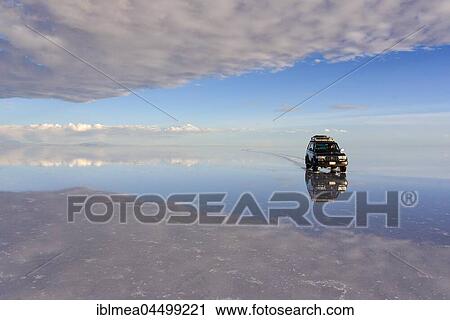 All terrain vehicle driving on a lake, water flooded salt lake, Salar de Uyuni, Altiplano, Bolivia, South America View Large Photo Image Stock Image - All terrain vehicle driving on a lake, water flooded salt lake, Salar de Uyuni, Altiplano, Bolivia, South America. Fotosearch