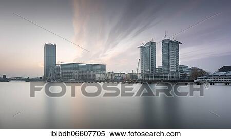 Allianz Tower and the Twin Towers on the Spree River, in front of them the Molecule Man monument by the American artist Jonathan Borofsky, Berlin, Germany, Europe View Large Photo Image Stock Photography - Allianz Tower and the Twin Towers on the Spree River, in front of them the Molecule Man monument by the American artist Jonathan Borofsky, Berlin, Germany, Europe. Fotosearch