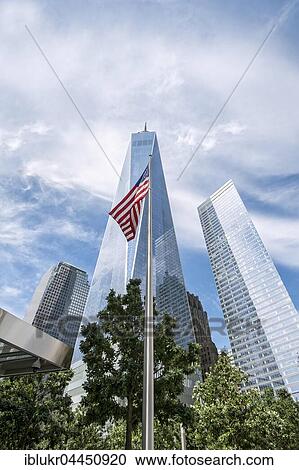 American flag in front of One World Trade Center, WTC, architect David Childs, at Ground Zero, Manhattan, New York City, United States, North America View Large Photo Image Stock Image - American flag in front of One World Trade Center, WTC, architect David Childs, at Ground Zero, Manhattan, New York City, United States, North America. Fotosearch