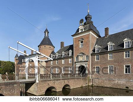 Stock Image - Anholt moated castle with drawbridge, Isselburg, Lower Rhine, Münsterland, North Rhine-Westphalia, Germany, Europe. Fotosearch