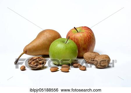 Stock Photograph - Apples, variety Greenstar, variety Diwa, pears variety Kaiser Alexander and walnut, Juglans regia, almond, almonds, Prunus dulcis, Pyrus communis var. sativa. Fotosearch