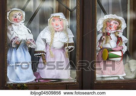 Stock Photograph - Aussee Carnival, little dolls in the window Trommelweiber, Bad Aussee, Styria, Austria, Europe. Fotosearch