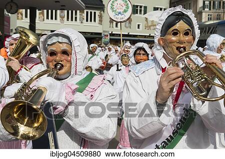 Aussee Carnival, men with masks and wind instruments, white robes, Trommelweiber, Bad Aussee, Styria, Austria, Europe View Large Photo Image Stock Image - Aussee Carnival, men with masks and wind instruments, white robes, Trommelweiber, Bad Aussee, Styria, Austria, Europe. Fotosearch