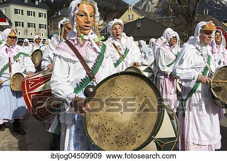 Aussee Carnival, men with masks and drums, white robes, Trommelweiber, Bad Aussee, Styria, Austria, Europe View Large Photo Image Stock Photo - Aussee Carnival, men with masks and drums, white robes, Trommelweiber, Bad Aussee, Styria, Austria, Europe. Fotosearch