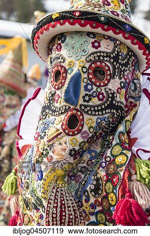 Ausseer Flinserl, dressed person in costume with face masking or Gugl and hat, sequins, different appliqué designs, Bad Aussee, Styria, Austria, Europe View Large Photo Image Stock Photo - Ausseer Flinserl, dressed person in costume with face masking or Gugl and hat, sequins, different appliqué designs, Bad Aussee, Styria, Austria, Europe. Fotosearch