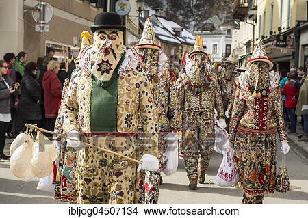 Ausseer Flinserl, front Zacherl with pigs' bladders, behind disguised people in costume with face masking or Gugl and hat, ruff or Kress, Bad Aussee, Styria, Austria, Europe View Large Photo Image Picture - Ausseer Flinserl, front Zacherl with pigs' bladders, behind disguised people in costume with face masking or Gugl and hat, ruff or Kress, Bad Aussee, Styria, Austria, Europe. Fotosearch
