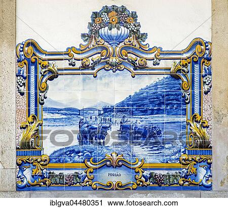 Stock Image - Azulejo, ceramic tile, transport of wine barrels with ox carts motif, Alto Douro Wine Region, Pinhao, Portugal, Europe. Fotosearch