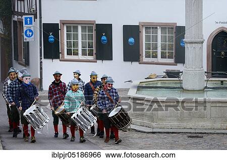 Stock Photograph - Basel Fasnacht, Gemsbergbrunnen, drummers' group at the Basel Fasnacht, Basel, Switzerland, Europe. Fotosearch