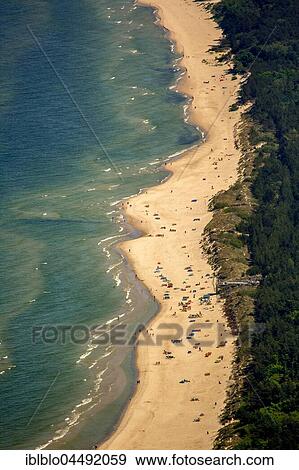 Bathers, Baltic Sea beach in Kołobrzeg, Kolobrzeg, Baltic Coast, West Pomerania Province, Poland, Europe View Large Photo Image Stock Photo - Bathers, Baltic Sea beach in Kołobrzeg, Kolobrzeg, Baltic Coast, West Pomerania Province, Poland, Europe. Fotosearch