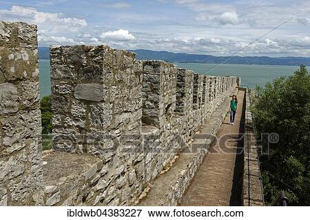 Battlements, Fortezza, Rocca del Leone, Castiglione del Lago, on Lake Trasimeno, Lago Trasimeno, Umbria, Italy, Europe View Large Photo Image Stock Photo - Battlements, Fortezza, Rocca del Leone, Castiglione del Lago, on Lake Trasimeno, Lago Trasimeno, Umbria, Italy, Europe. Fotosearch