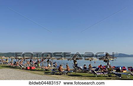 Beach at Torricella, Lake Trasimeno, eastern shore, Umbria, Italy, Europe View Large Photo Image Stock Photo - Beach at Torricella, Lake Trasimeno, eastern shore, Umbria, Italy, Europe. Fotosearch