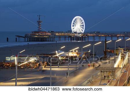 Beach boardwalk on the pier at night, Scheveningen, The Hague, Holland, The Netherlands, Europe View Large Photo Image Stock Image - Beach boardwalk on the pier at night, Scheveningen, The Hague, Holland, The Netherlands, Europe. Fotosearch