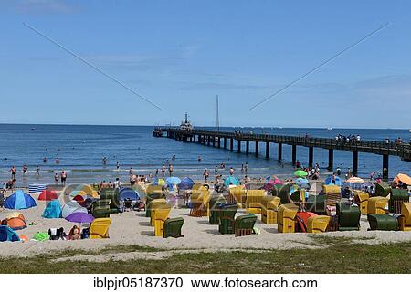 Beach chairs and pier, Seaside resort Binz, Binz, Island of Rügen, Mecklenburg-Vorpommern, Germany, Europe View Large Photo Image Stock Image - Beach chairs and pier, Seaside resort Binz, Binz, Island of Rügen, Mecklenburg-Vorpommern, Germany, Europe. Fotosearch