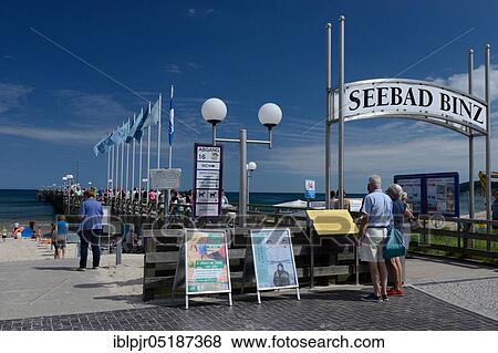 Beach promenade with sign, Seaside resort Binz, Binz, Island of Rügen, Mecklenburg-Vorpommern, Germany. Europe View Large Photo Image Stock Photo - Beach promenade with sign, Seaside resort Binz, Binz, Island of Rügen, Mecklenburg-Vorpommern, Germany. Europe. Fotosearch