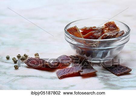Stock Image - Beef Jerky, dried beef. Fotosearch