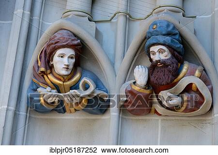 Stock Image - Bernese Minster figures at the cathedral portal, Bern, Switzerland, Europe. Fotosearch