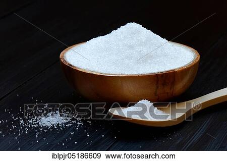 Stock Photo - Birch sugar in bowl and spoon, xylitol, xylitol. Fotosearch