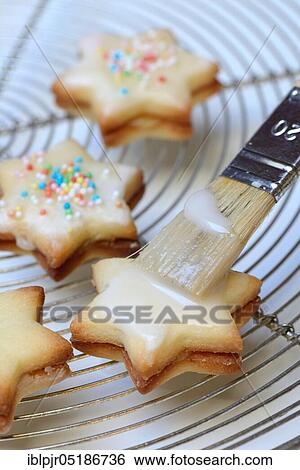 Stock Photograph - Biscuits with glaze, icing, glaze. Fotosearch