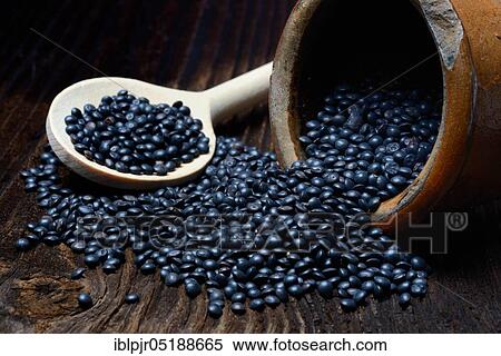 Black lentils, beluga lentils, cooking spoon View Large Photo Image Stock Photography - Black lentils, beluga lentils, cooking spoon. Fotosearch