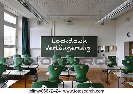 Board with inscription LOCKDOWN EXTENSION, classroom, Corona crisis, Germany, Europe View Large Photo Image Picture - Board with inscription LOCKDOWN EXTENSION, classroom, Corona crisis, Germany, Europe. Fotosearch