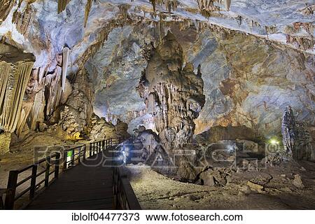 Boardwalk through illuminated dripstone cave, stalactites and stalagmites, Thiên Đường Cave, National Park Phong Nha-Ke Bang, Phong Nha, Quang Binh, Vietnam, Asia View Large Photo Image Stock Image - Boardwalk through illuminated dripstone cave, stalactites and stalagmites, Thiên Đường Cave, National Park Phong Nha-Ke Bang, Phong Nha, Quang Binh, Vietnam, Asia. Fotosearch