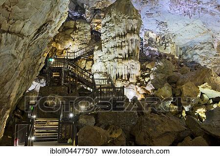 Boardwalk through illuminated dripstone cave, stalactites and stalagmites, Thiên Đường Cave, National Park Phong Nha-Ke Bang, Phong Nha, Quang Binh, Vietnam, Asia View Large Photo Image Stock Photo - Boardwalk through illuminated dripstone cave, stalactites and stalagmites, Thiên Đường Cave, National Park Phong Nha-Ke Bang, Phong Nha, Quang Binh, Vietnam, Asia. Fotosearch