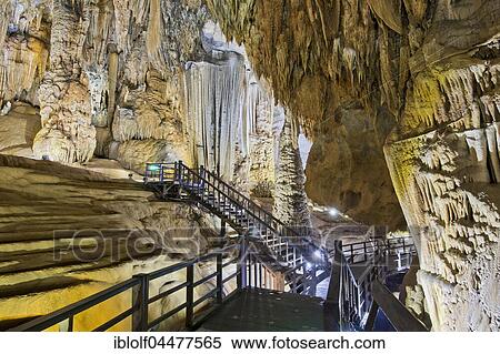 Boardwalk through illuminated dripstone cave, stalactites and stalagmites, Thiên Đường Cave, National Park Phong Nha-Ke Bang, Phong Nha, Quang Binh, Vietnam, Asia View Large Photo Image Stock Photography - Boardwalk through illuminated dripstone cave, stalactites and stalagmites, Thiên Đường Cave, National Park Phong Nha-Ke Bang, Phong Nha, Quang Binh, Vietnam, Asia. Fotosearch