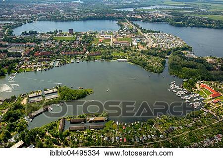 Picture - Boathouses on Heidensee, Schwerin, Mecklenburg-Western Pomerania, Germany, Europe. Fotosearch