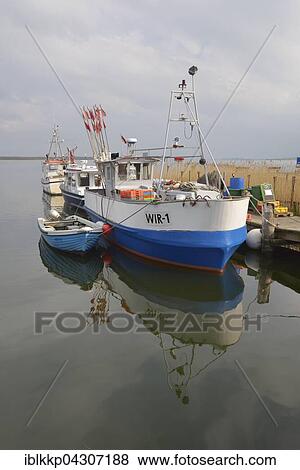 Boats on dock, Jasmunder Bodden, Rügen, Mecklenburg-Western Pomerania, Germany, Europe View Large Photo Image Stock Photo - Boats on dock, Jasmunder Bodden, Rügen, Mecklenburg-Western Pomerania, Germany, Europe. Fotosearch