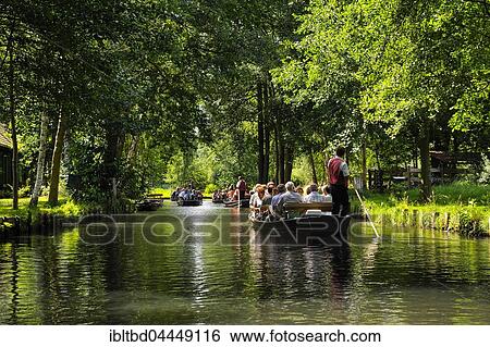 Boats with tourists on Fließ river, Lehde district, Lübbenau, Spreewald, Spreewald Nature Reserve and Biosphere Reserve, Brandenburg, Germany, Europe View Large Photo Image Stock Photograph - Boats with tourists on Fließ river, Lehde district, Lübbenau, Spreewald, Spreewald Nature Reserve and Biosphere Reserve, Brandenburg, Germany, Europe. Fotosearch
