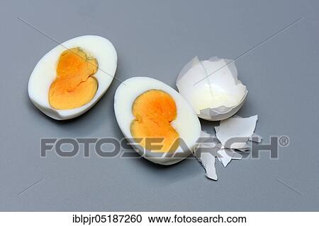 Stock Image - Boiled hen's egg with double yolk. Fotosearch