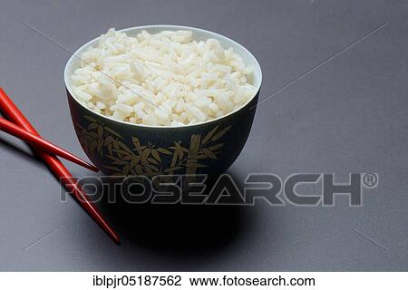 Boiled rice in bowl with chopsticks, basmati rice View Large Photo Image Stock Image - Boiled rice in bowl with chopsticks, basmati rice. Fotosearch