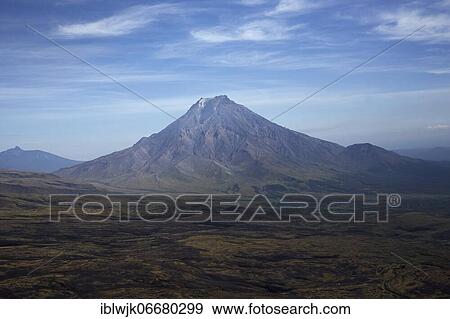 Bolshaya Udina volcano, in front of it lava field of the active volcano Tolbatschik, Kamchatka, Russia, Europe View Large Photo Image Stock Photo - Bolshaya Udina volcano, in front of it lava field of the active volcano Tolbatschik, Kamchatka, Russia, Europe. Fotosearch