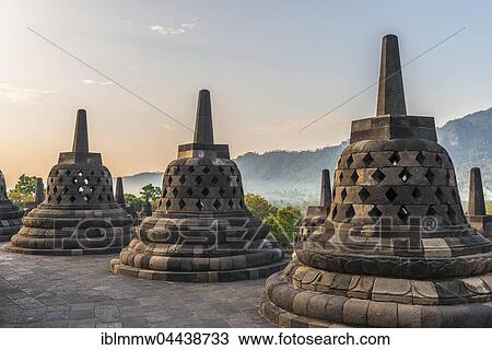 Stock Image - Borobudur Temple at sunrise, stupas, Borobudur, Yogyakarta, Java, Indonesia, Asia. Fotosearch