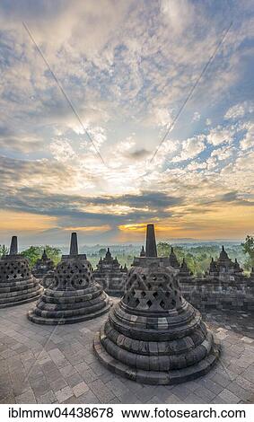 Borobudur Temple at sunrise, stupas, cloudy sky, Borobudur, Yogyakarta, Java, Indonesia, Asia View Large Photo Image Stock Photo - Borobudur Temple at sunrise, stupas, cloudy sky, Borobudur, Yogyakarta, Java, Indonesia, Asia. Fotosearch