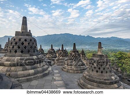 Stock Photo - Borobudur Temple Complex, cloudy sky, stupas, Borobudur, Yogyakarta, Java, Indonesia, Asia. Fotosearch