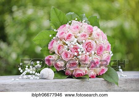 Stock Photograph - Bouquet on wooden board. Fotosearch