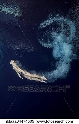 Boy diving into pool, underwater, Nikolaev, Ukraine, Europe View Large Photo Image Stock Photography - Boy diving into pool, underwater, Nikolaev, Ukraine, Europe. Fotosearch