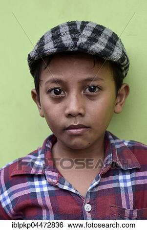 Boy with shirt and flat cap, Portrait, Phnom Penh Province, Cambodia, Asia View Large Photo Image Stock Photograph - Boy with shirt and flat cap, Portrait, Phnom Penh Province, Cambodia, Asia. Fotosearch