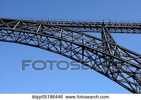 Stock Photograph - Bridge over the Douro, iron construction, Gustave Eiffel, wrought iron bridge Ponte de D. Maria Pia, Porto, Portugal, Europe. Fotosearch