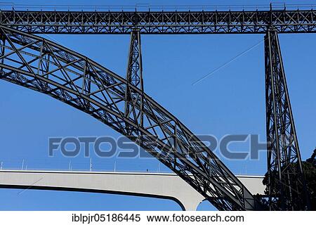Stock Photography - Bridges over the Douro, iron construction, Gustave Eiffel, wrought iron bridge Ponte de Maria Pia and modern bridge Ponte de Sao Joao, Porto, Portugal, Europe. Fotosearch